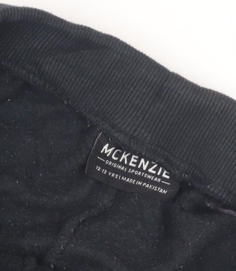 Close-up detail of McKenzie boys’ black jogger trousers 12-13 years