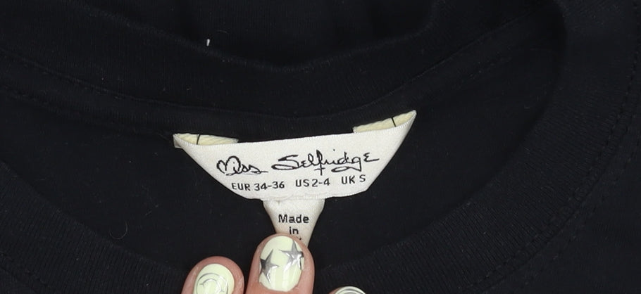 Close-up detail of Miss Selfridge Women's Black T-Shirt, size 6