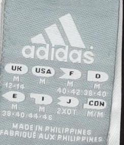 Close-up detail of Adidas Women's Black Capri Trousers M Stretch