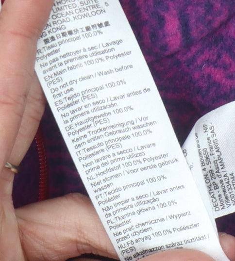 Brand and care label for Decathlon girls’ purple fleece sweatshirt 14 years zip winter