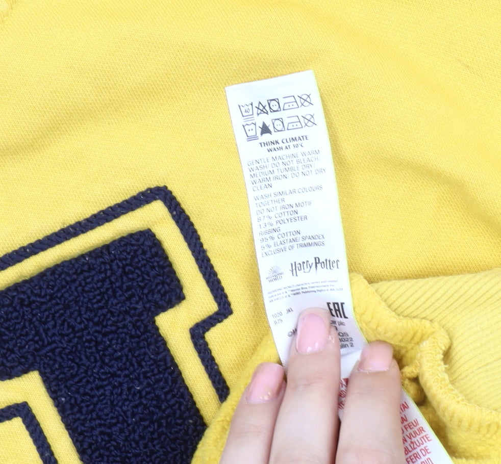 Brand and care label for Marks & Spencer boys’' yellow harry potter sweatshirt 8-9