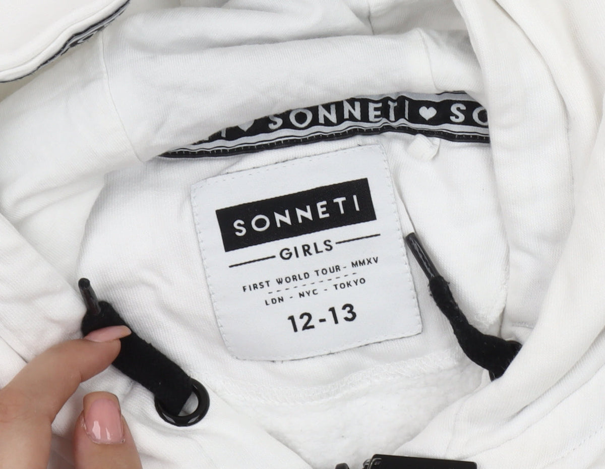 Close-up detail of Sonneti girls’ white hoodie 12-13 years with zip pockets