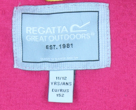 Brand and care label for Regatta girls’ pink fleece pullover, size 11-12, lightweight
