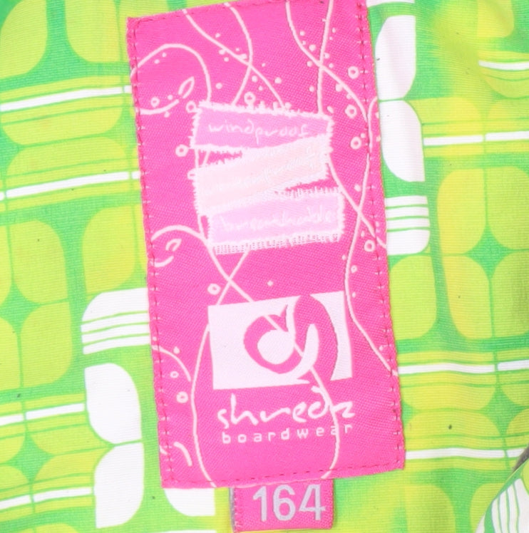 Brand and care label for girls’ green ski jacket, size 12, winter breathable outerwear
