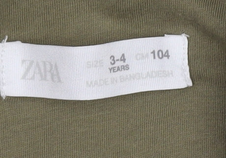 Brand and care label for Zara boys’ green quilted jacket 3-4 years