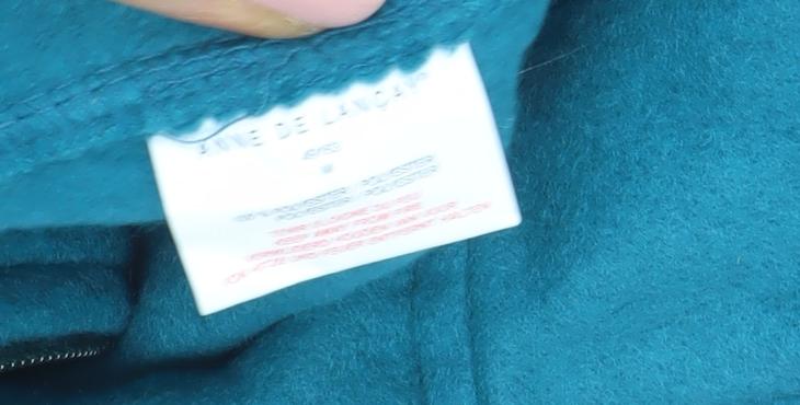 Close-up detail of Anne De Lancay Women's Blue Fleece Jacket - Mid-Length, size M, Casual Wear