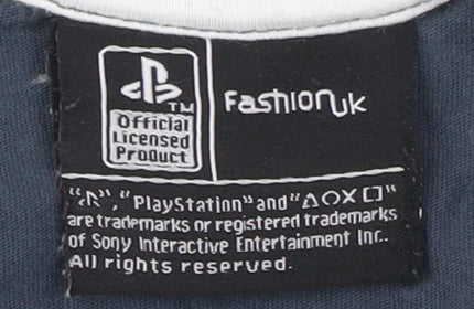 Brand and care label for Fashion UK boys’' blue playstation t-shirt, size 6-7, years
