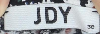 Brand and care label for JDY Women's Black Floral Shorts, size 10, Casual Viscose