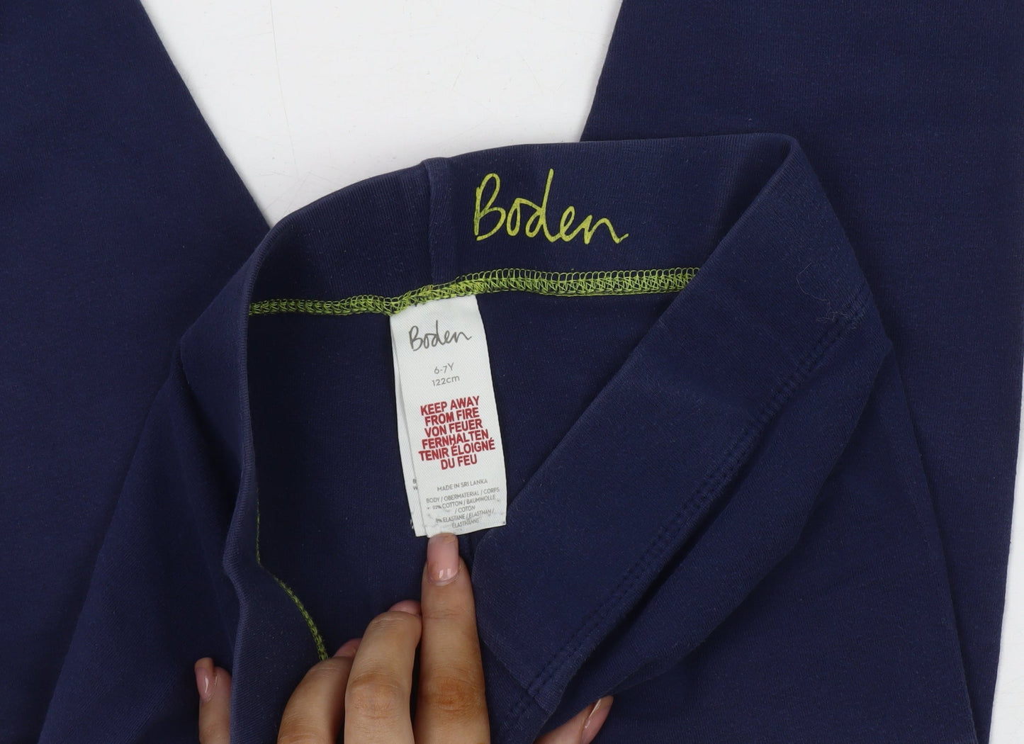 Close-up detail of Boden girls’ blue ankle leggings 6-7 years