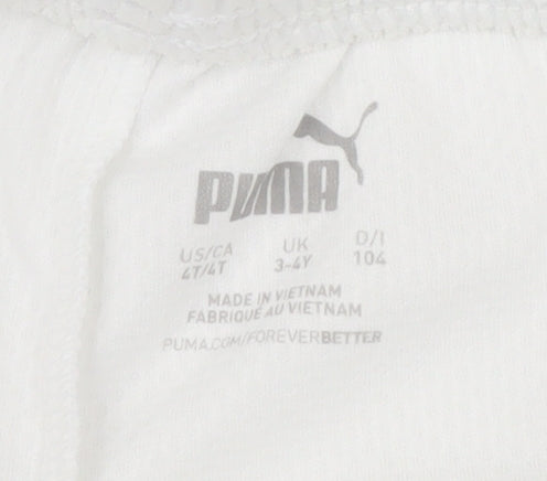 Brand and care label for Puma boys’ white athletic shorts 3-4y football