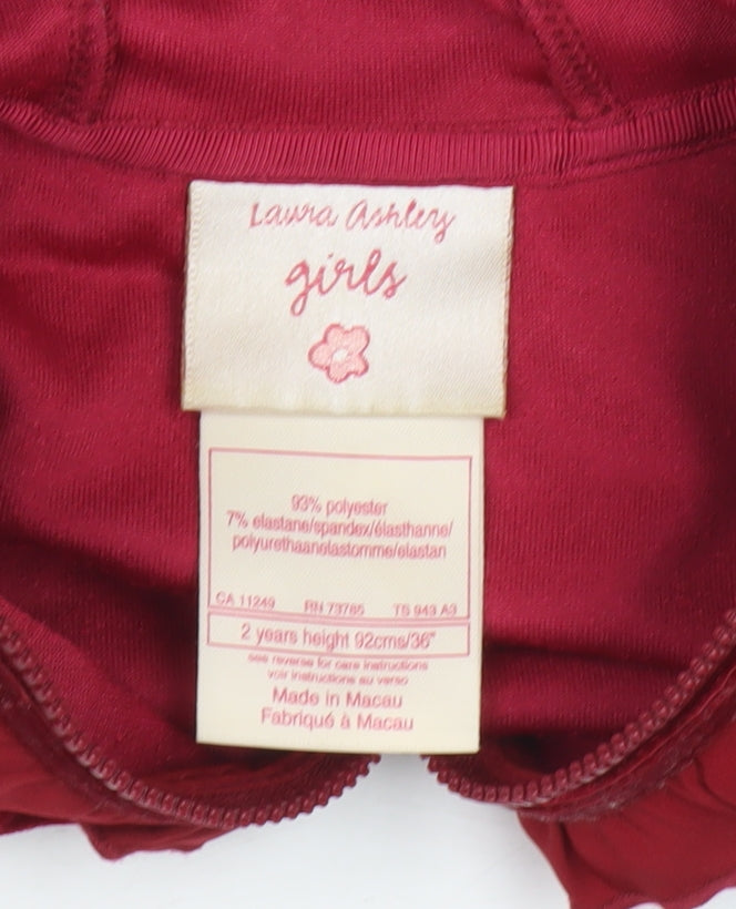 Close-up detail of Laura Ashley girls’ red velvet hooded jacket 2 years
