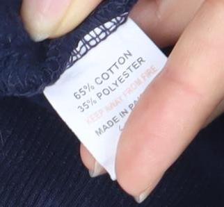 Brand and care label for MFC boys’ blue jogger trousers 13-14 years casual drawstring