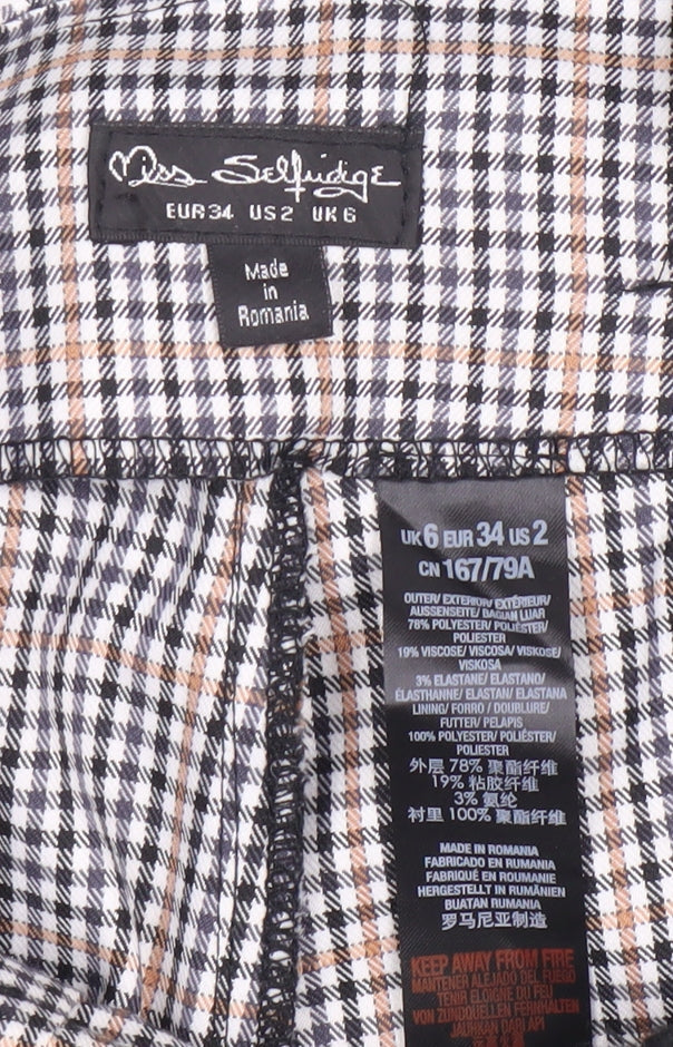 Close-up detail of Miss Selfridge Women's Multicoloured Check Trousers, size 6
