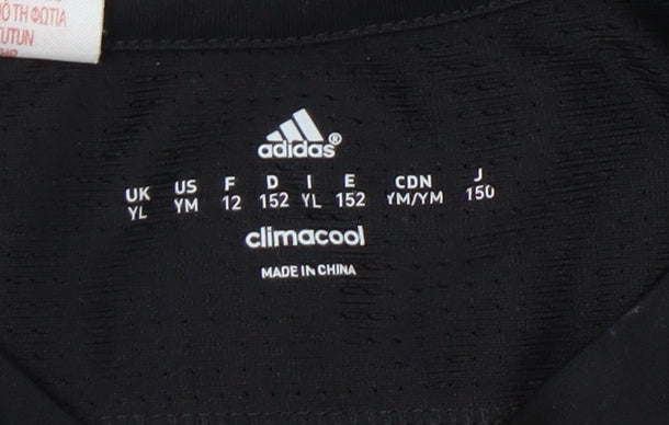 Brand and care label for Adidas boys’ black football t-shirt 12 years