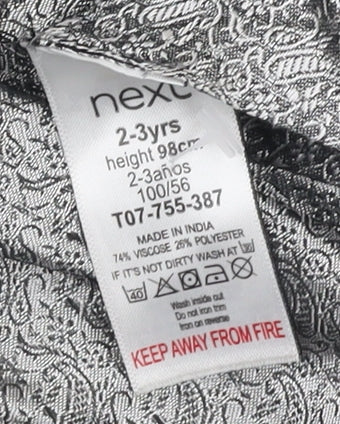 Close-up detail of Next girls’ grey geometric blouse - 2-3 years, button accents