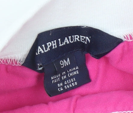 Brand and care label for Ralph Lauren girls’ pink white skort 9-12 months athletic style