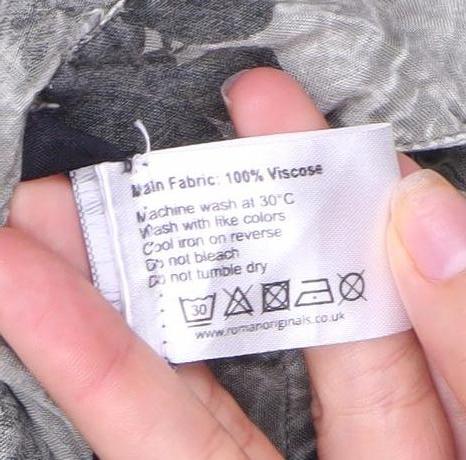 Brand and care label for Roman Women's Grey Floral Button Skirt, size 18