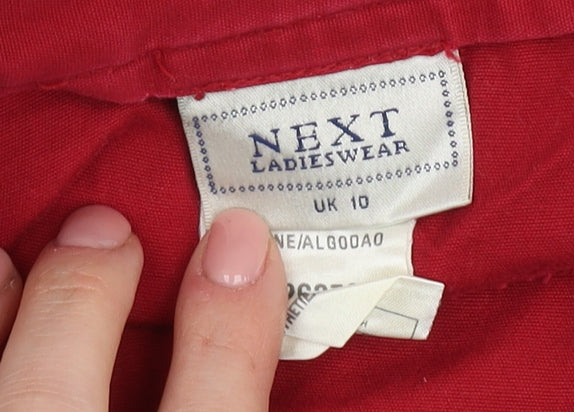 Brand and care label for Next Ladieswear Red Cotton Skirt UK 10