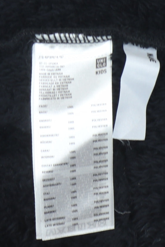 Brand and care label for Uniqlo girls’ black fleece jacket 3-4 years