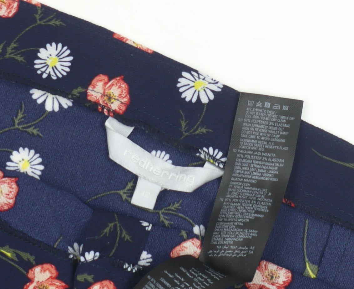 Close-up detail of Red Herring Women's Floral Button Skirt, size 12