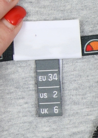 Brand and care label for Ellesse Women's Grey Red Hoodie, size 6