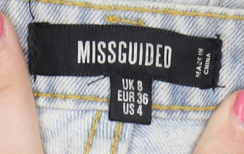 Brand and care label for Missguided Women's Blue Denim Cut-Off Shorts, size 8