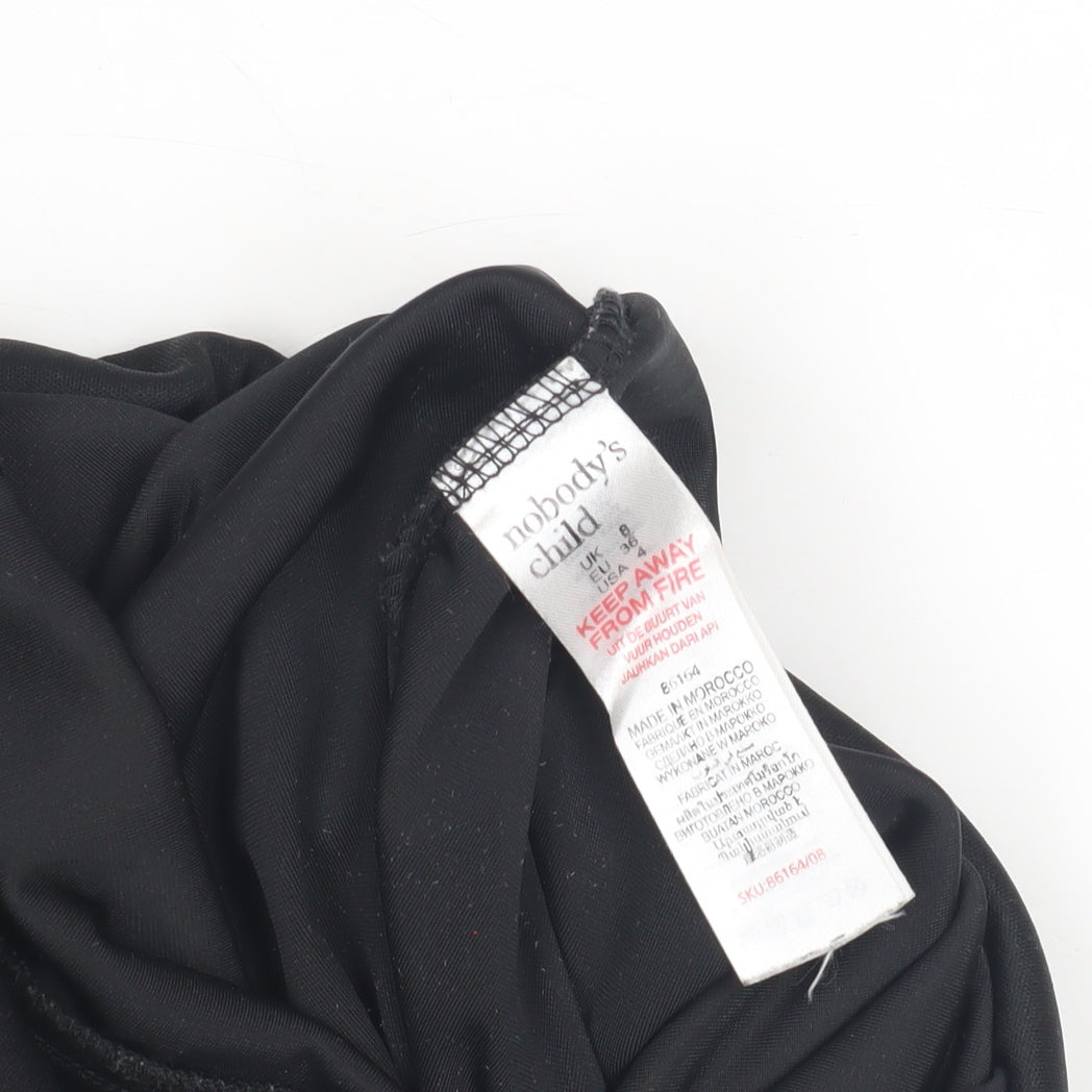 Close-up detail of Nobody's Child Women's Black Floral Jumpsuit, size 8