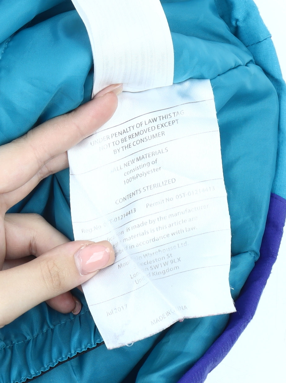 Brand and care label for Mountain Warehouse girls’ blue puffer jacket 7-8 years