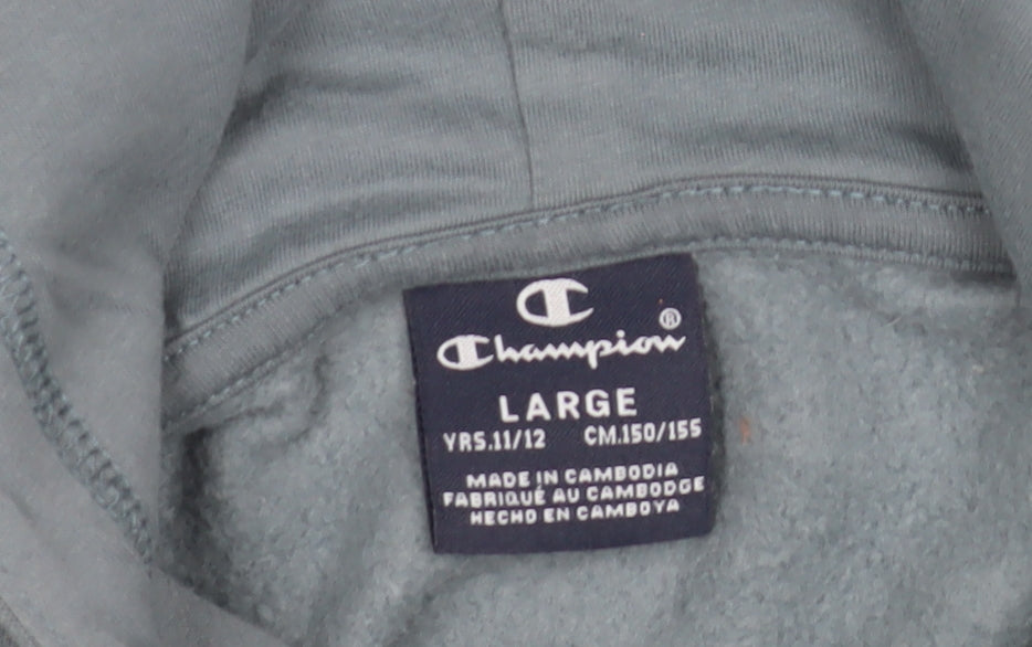 Close-up detail of Champion boys’ blue pullover hoodie l - sporty & stylish