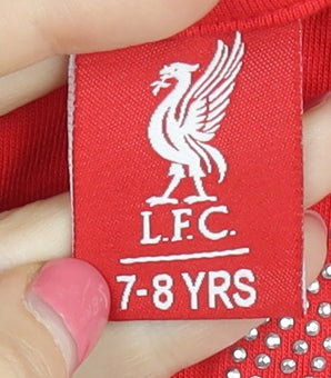 Brand and care label for LFC girls’ red t-shirt, 7-8 years, cotton, football graphic