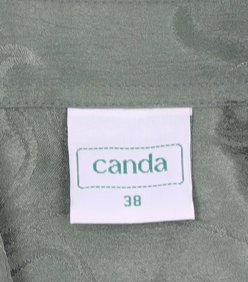 Close-up detail of Canda Women's Green Floral Button-Up Shirt, size 10