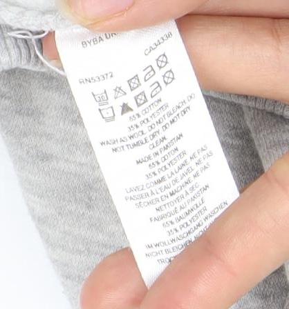 Brand and care label for French Connection boys’ grey jogger trousers 11-12 years