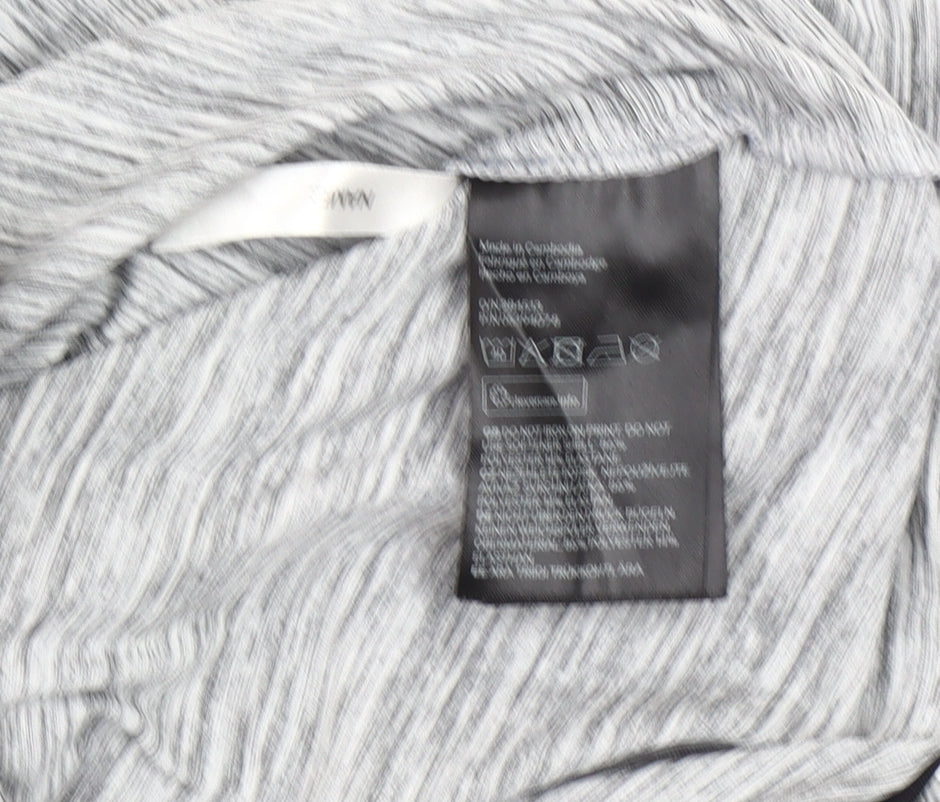 Brand and care label for H&M girls’ grey track jacket age 12-14 sports activewear