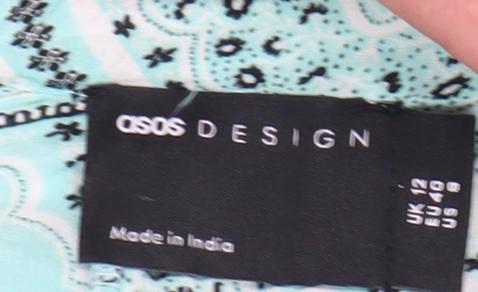 Close-up detail of ASOS DESIGN Women's Blue Geometric Midi Skirt