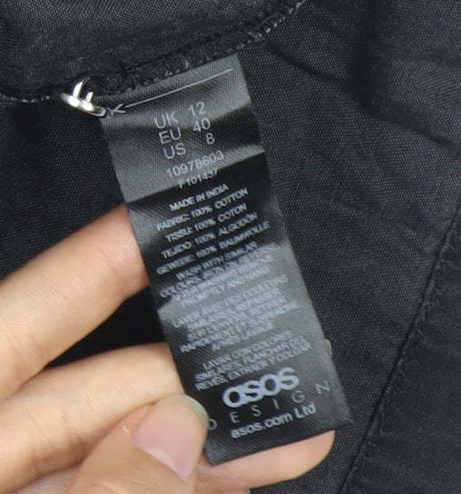 Close-up detail of ASOS Women's Black Shift Dress, size 12, Casual