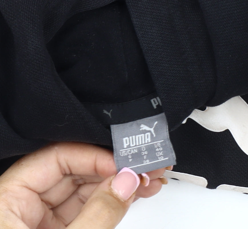 Close-up detail of Puma boys’ black pullover hoodie m - casual sportswear