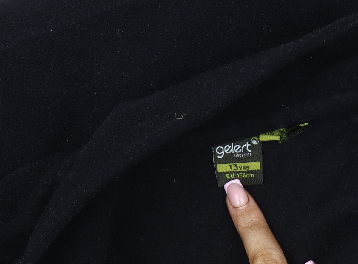 Close-up detail of Gelert boys’ black fleece jacket 13 years full zip casual