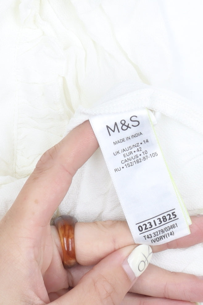 Brand and care label for Marks & Spencer Women's Ivory Long Sleeve Top, size 14