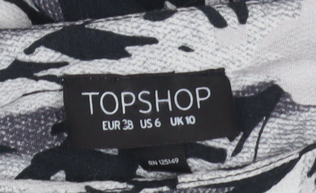 Close-up detail of Topshop Women's Multicoloured Raglan Floral Top, size 10