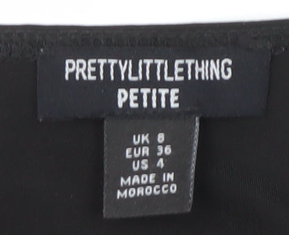 Brand and care label for PRETTYLITTLETHING Black Long Sleeve Top Women, size 8