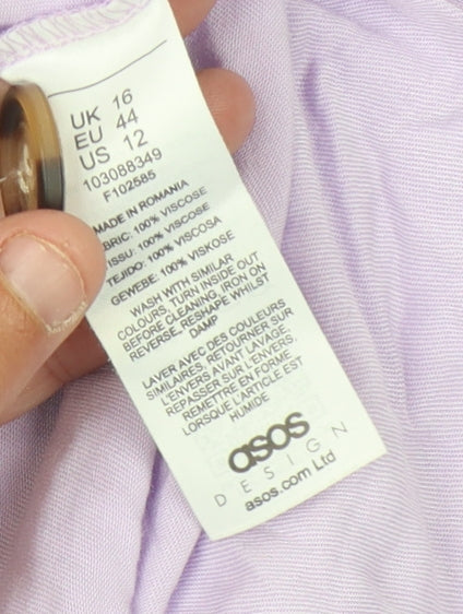 Close-up detail of ASOS Design Women's Purple Button V-Neck Top