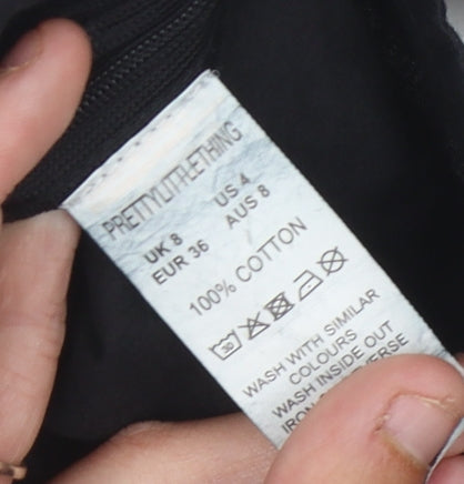 Close-up detail of PRETTYLITTLETHING Black Cropped Top, UK, size 8