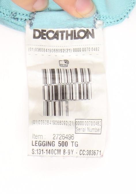 Close-up detail of Decathlon girls’' blue ankle leggings - 9-10 years