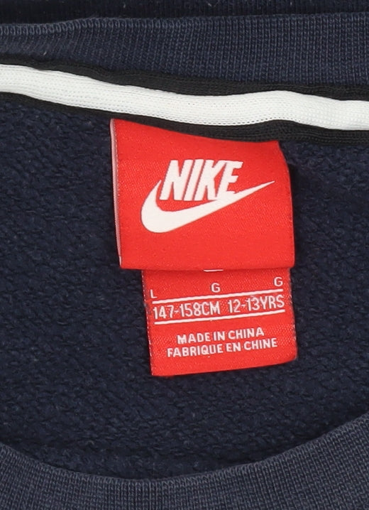 Brand and care label for Nike boys’ blue crew neck sweatshirt l with logo accents