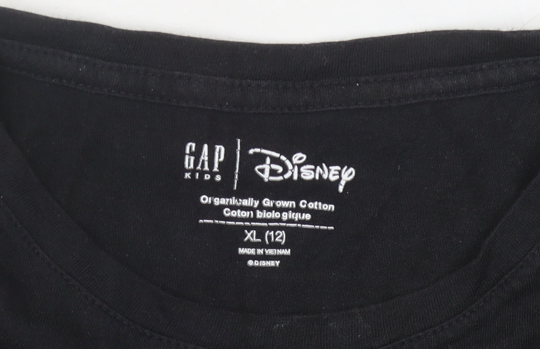 Close-up detail of Gap Kids Disney girls’ black t-shirt, xl, mickey mouse design