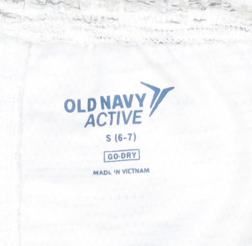 Close-up detail of Old Navy boys’' white athletic shorts 6-7 years