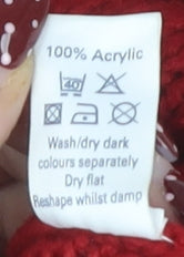 Brand and care label for Mackays Red Roll Neck jumper, size S