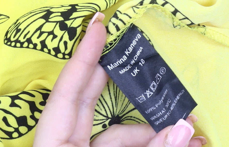 Brand and care label for Marina Kaneva Yellow Animal Print Flutter Top