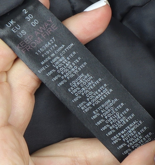 Brand and care label for ASOS DESIGN Women's Black Petite Jacket, size 2