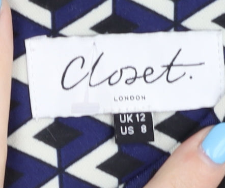 Brand and care label for Closet London Women's Blue Geometric Dress, size 12